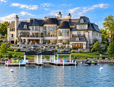 Gatsby custom home in Oconomowoc by Kingfogl – lakefront rear elevation with boat docks