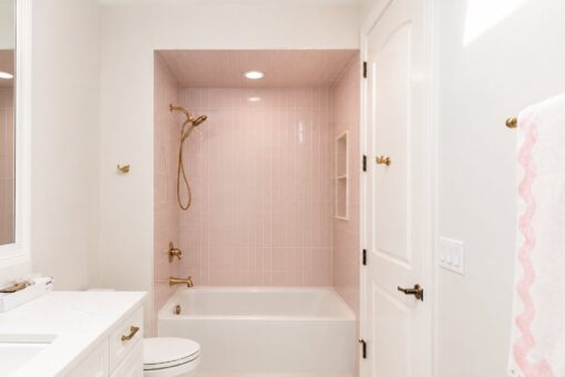 Oriole custom home in Mequon by Kingfogl – 2nd floor - bath - pink tile