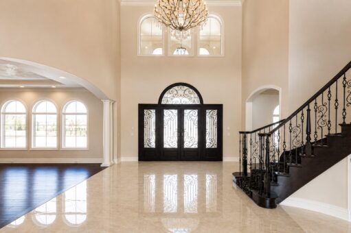 Prescott custom home in Mequon by Kingfogl – foyer front doors