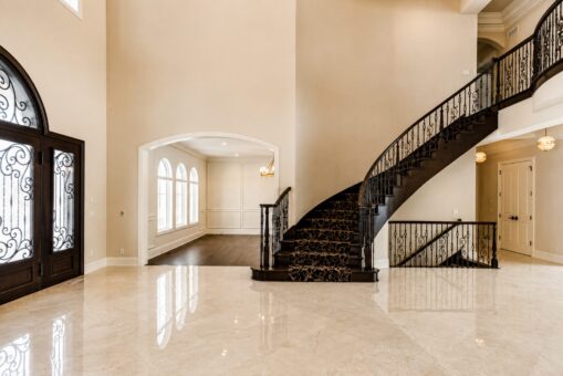 Prescott custom home in Mequon by Kingfogl – foyer staircase and front doors