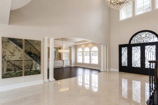 Prescott custom home in Mequon by Kingfogl – foyer view to dining room