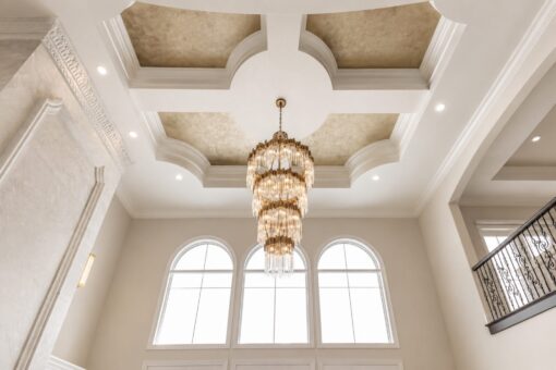 Prescott custom home in Mequon by Kingfogl – ceiling coffered with chandelier
