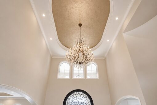 Prescott custom home in Mequon by Kingfogl – ceiling foyer chandelier