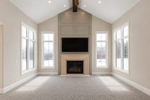 Prescott custom home in Mequon by Kingfogl – primary bedroom fireplace