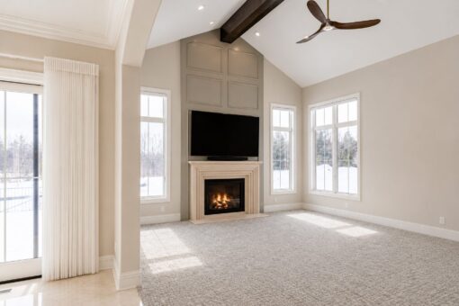 Prescott custom home in Mequon by Kingfogl – primary bedroom fireplace view 2