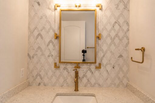 Prescott custom home in Mequon by Kingfogl – powder room vanity
