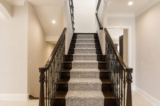 Prescott custom home in Mequon by Kingfogl – back staircase