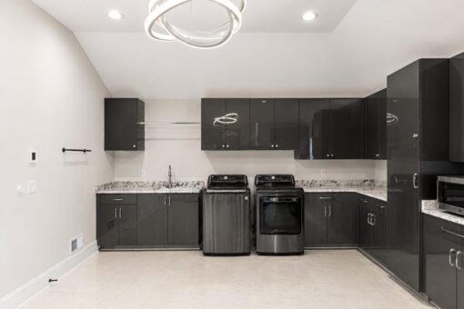 Prescott custom home in Mequon by Kingfogl – 2nd floor laundry room