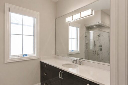 Prescott custom home in Mequon by Kingfogl – bath glass shower vanity