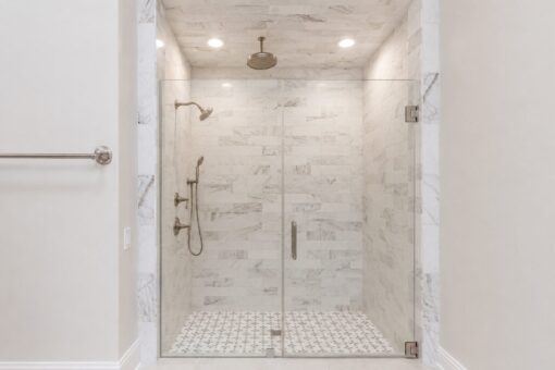 Prescott custom home in Mequon by Kingfogl – bath marble tile shower