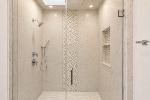 Prescott custom home in Mequon by Kingfogl – bath patterned tile shower