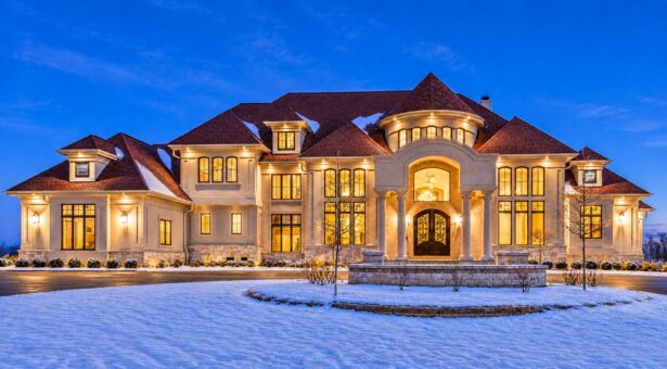 Presidio custom home in Brookfield by Kingfogl – front elevation at dusk