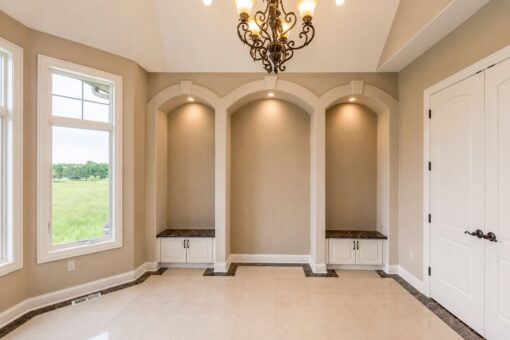 Richland custom home in Brookfield by Kingfogl – 1st floor - foyer - arched niches