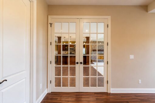 Richland custom home in Brookfield by Kingfogl – basement - french doors