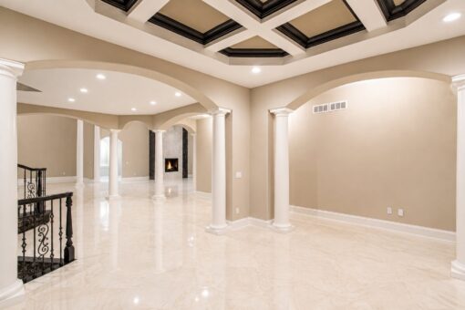 Saddlebrook custom home in Mequon by Kingfogl – foyer toward great room view 1