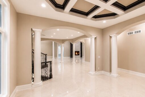 Saddlebrook custom home in Mequon by Kingfogl – foyer toward great room view 2