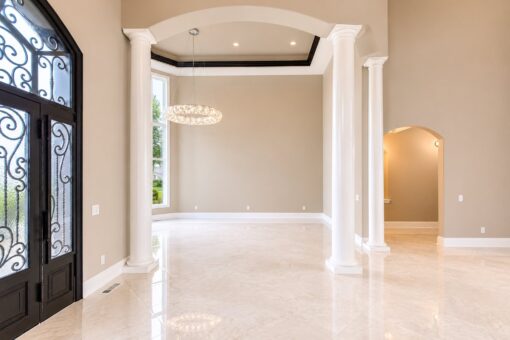 Saddlebrook custom home in Mequon by Kingfogl – foyer toward study view 1