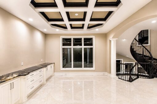 Saddlebrook custom home in Mequon by Kingfogl – dining room built-ins and spiral staircase