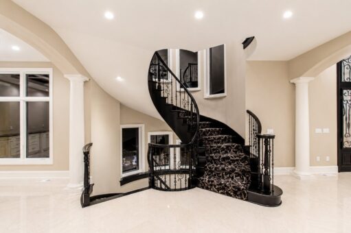 Saddlebrook custom home in Mequon by Kingfogl – spiral staircase