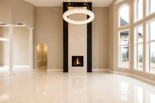 Saddlebrook custom home in Mequon by Kingfogl – great room fireplace and windows day