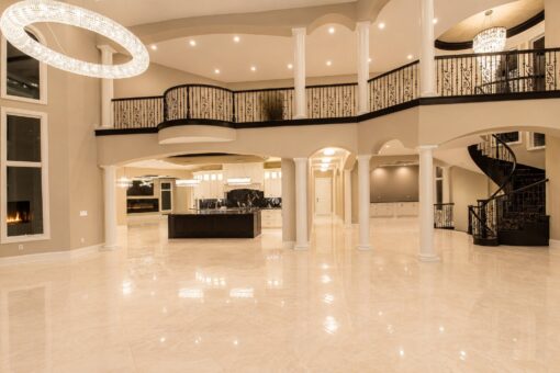 Saddlebrook custom home in Mequon by Kingfogl – great room toward kitchen and staircase night