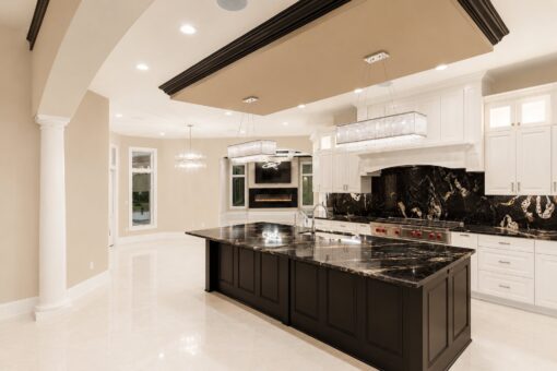 Saddlebrook custom home in Mequon by Kingfogl – kitchen island and range