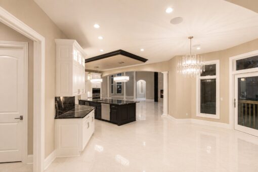 Saddlebrook custom home in Mequon by Kingfogl – kitchen from rear hallway