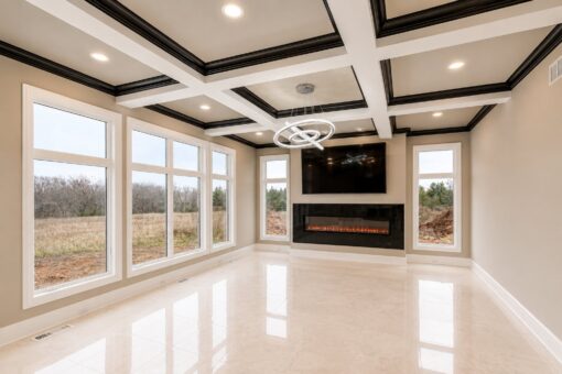 Saddlebrook custom home in Mequon by Kingfogl – family room fireplace view 1