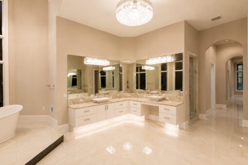 Saddlebrook custom home in Mequon by Kingfogl – primary bathroom vanity and tub