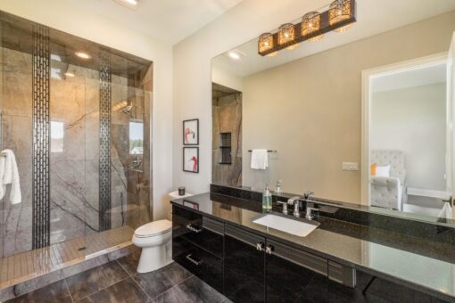Saddlebrook custom home in Mequon by Kingfogl – 2nd floor bathroom 2 shower and vanity