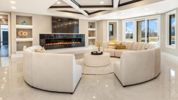Saddlebrook custom home in Mequon by Kingfogl – basement family room fireplace