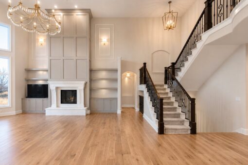 Sanctuary custom home in Menomonee Falls by Kingfogl – great room fireplace and staircase