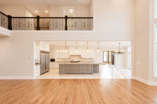 Sanctuary custom home in Menomonee Falls by Kingfogl – great room toward kitchen and balcony