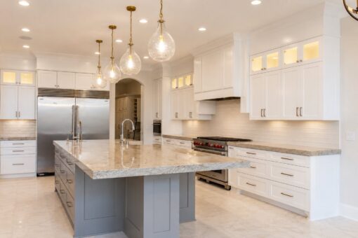 Sanctuary custom home in Menomonee Falls by Kingfogl – kitchen island and range