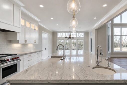 Sanctuary custom home in Menomonee Falls by Kingfogl – kitchen island toward breakfast area view 1