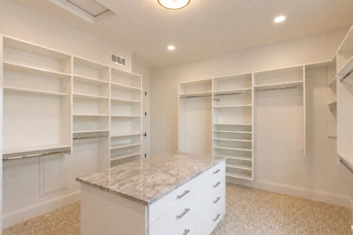 Sanctuary custom home in Menomonee Falls by Kingfogl – primary closet island