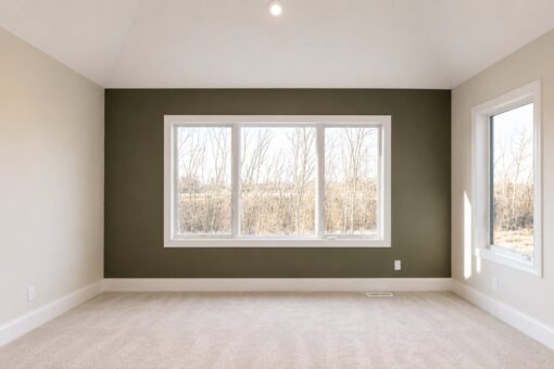 Sanctuary custom home in Menomonee Falls by Kingfogl – 2nd floor bedroom with green accent wall