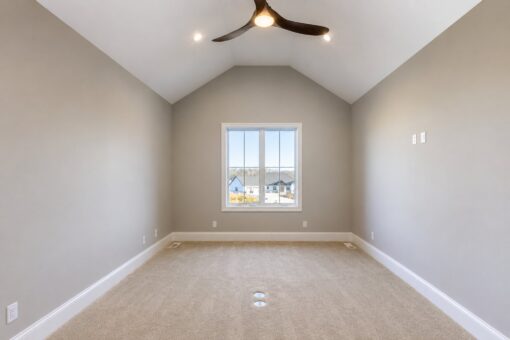 Sanctuary custom home in Menomonee Falls by Kingfogl – 2nd floor vaulted bedroom with ceiling fan