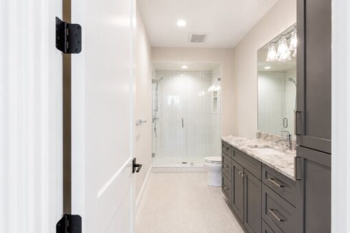 Sanctuary custom home in Menomonee Falls by Kingfogl – 2nd floor bathroom shower and vanity view 1