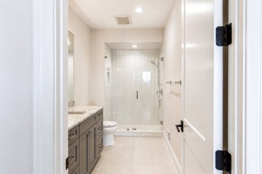 Sanctuary custom home in Menomonee Falls by Kingfogl – 2nd floor bathroom shower and vanity view 2