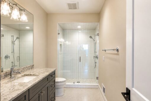Sanctuary custom home in Menomonee Falls by Kingfogl – 2nd floor bathroom shower and vanity view 3
