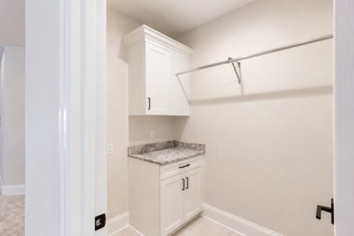 Sanctuary custom home in Menomonee Falls by Kingfogl – 2nd floor laundry room