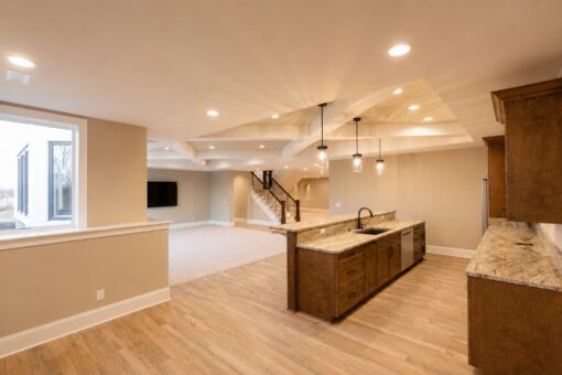 Sanctuary custom home in Menomonee Falls by Kingfogl – basement bar kitchen and recreation room view 3