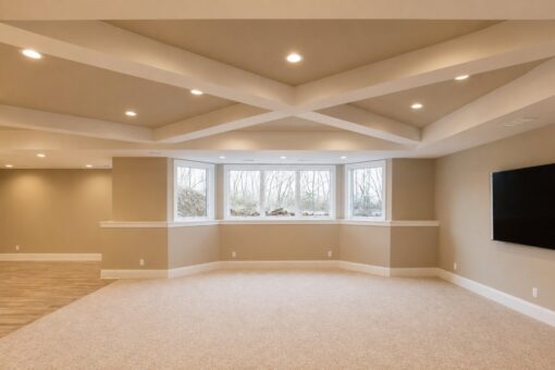 Sanctuary custom home in Menomonee Falls by Kingfogl – basement family room coffered ceiling and windows