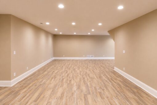 Sanctuary custom home in Menomonee Falls by Kingfogl – basement recreation room wide view