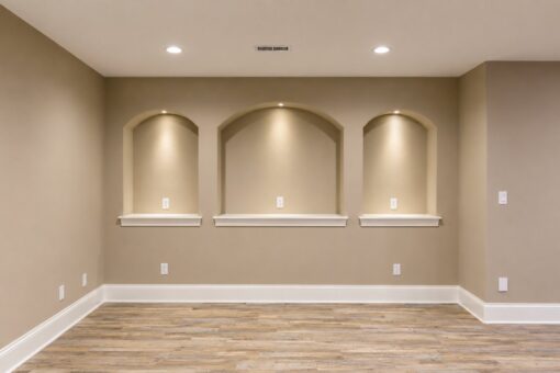 Sanctuary custom home in Menomonee Falls by Kingfogl – basement display niches view 1