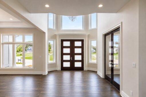 Turnberry custom home in New Berlin by Kingfogl – foyer front entry and office french doors