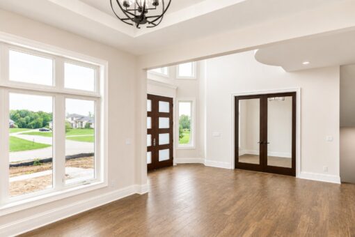 Turnberry custom home in New Berlin by Kingfogl – foyer front doors and office french doors