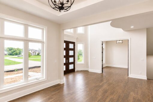 Turnberry custom home in New Berlin by Kingfogl – foyer front entry from dining room