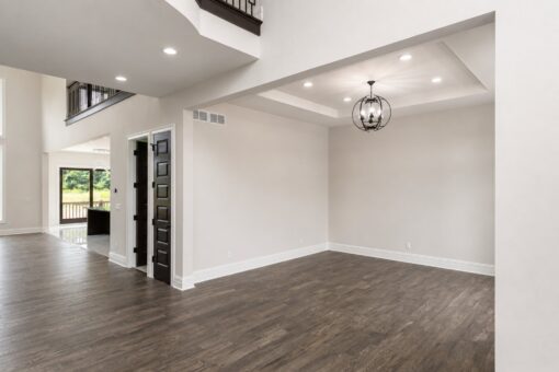 Turnberry custom home in New Berlin by Kingfogl – dining room from great room